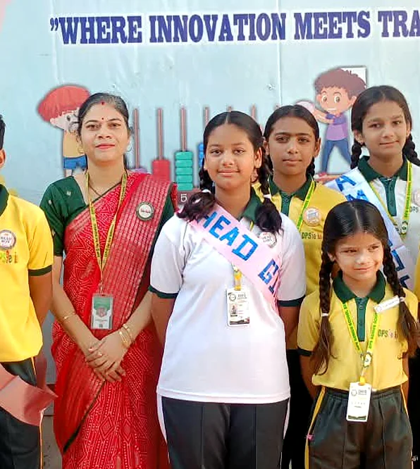 Head Girl, students and a teacher at DPS Genius